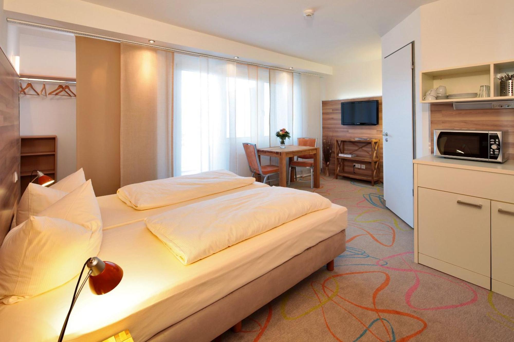 Petul Apart Hotel City Garden Essen Bagian luar foto