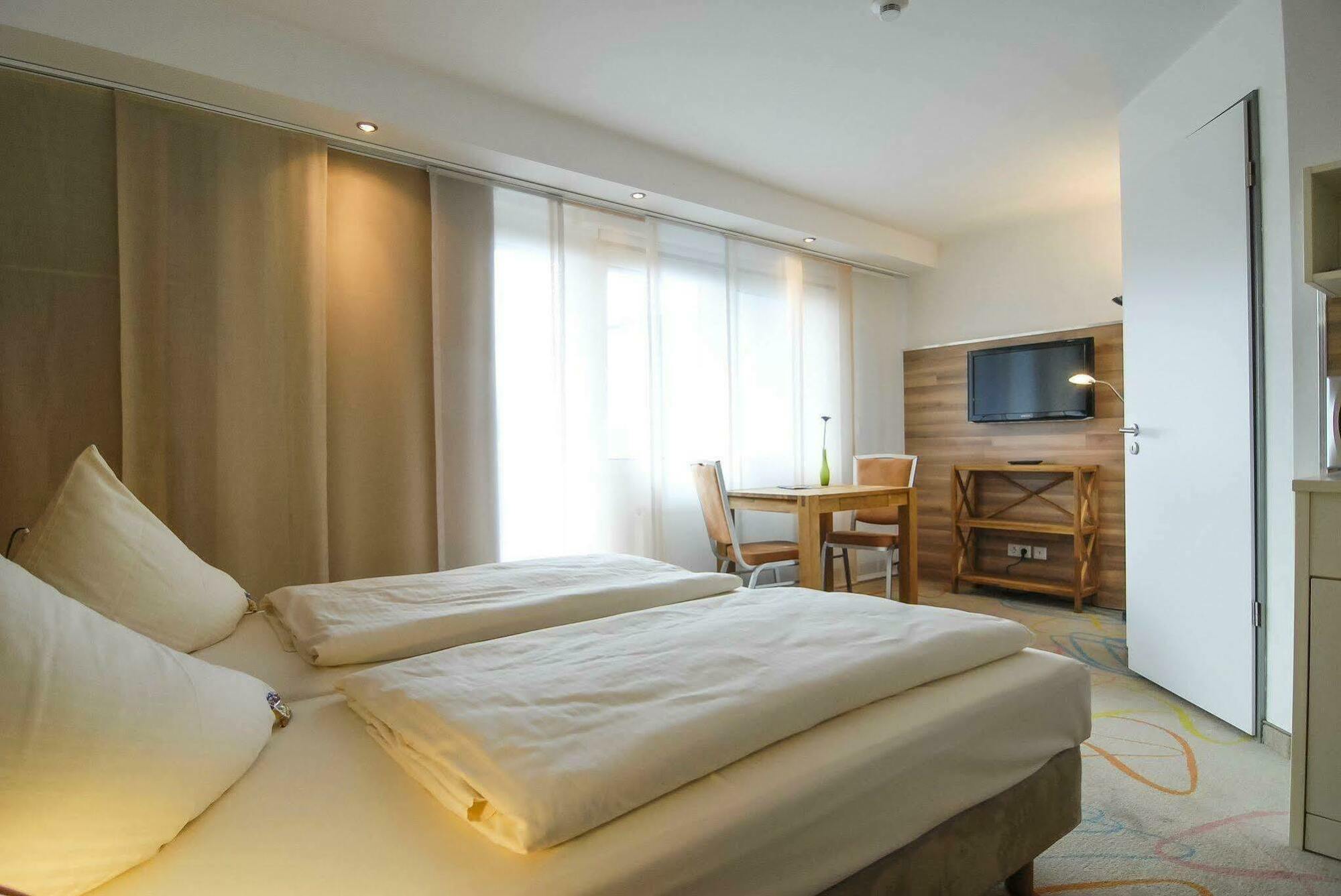 Petul Apart Hotel City Garden Essen Bagian luar foto